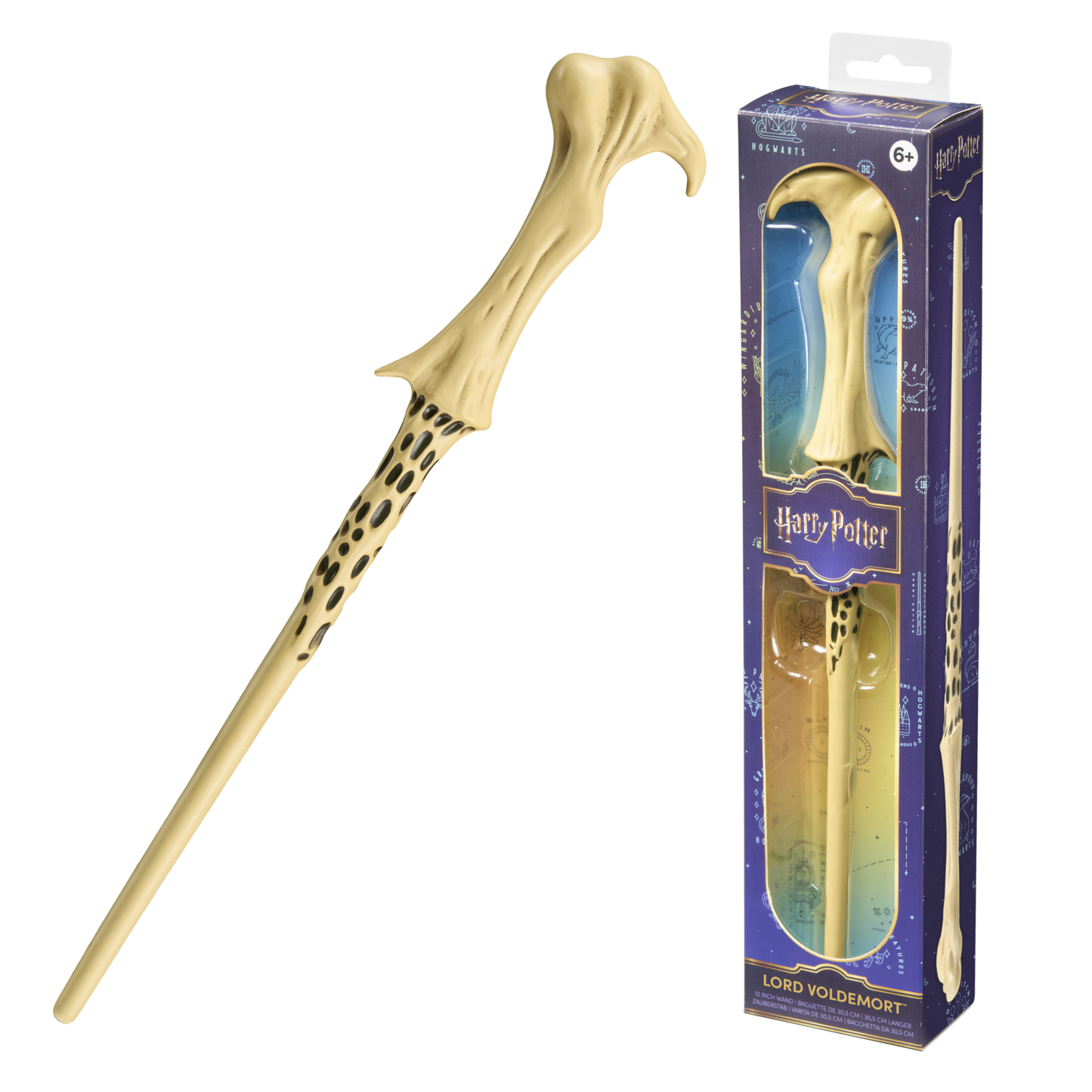 Gold lord voldemort harry potter wand with dark markings next to its packaging on a white background