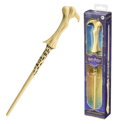 Gold lord voldemort harry potter wand with dark markings next to its packaging on a white background